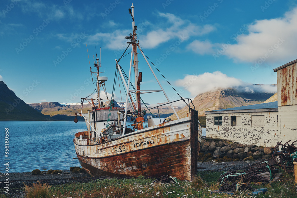 Old abandoned ship on the shore. Iceland.