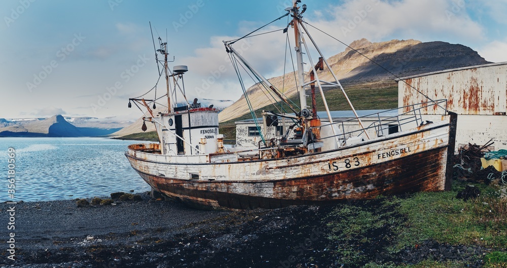 Old abandoned ship on the shore. Iceland.