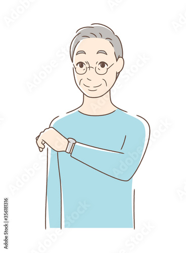 腕時計を見る男性
