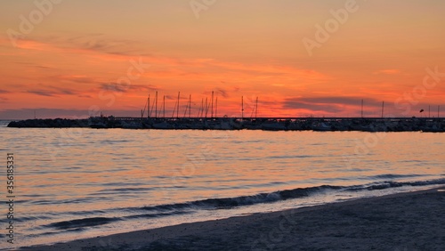 sunset over the sea in Vada in the municipality of Rosignano Marittimo, Livorno, Italy