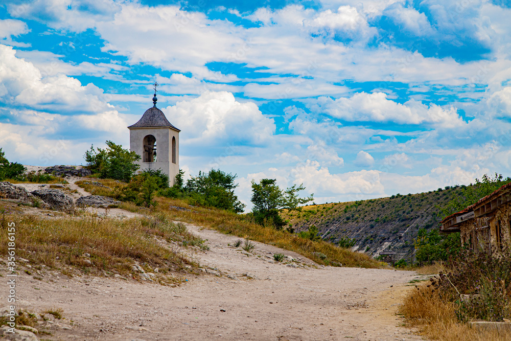 The bell tower of the cave monastery in Old Orhei, Moldova. July 2019.