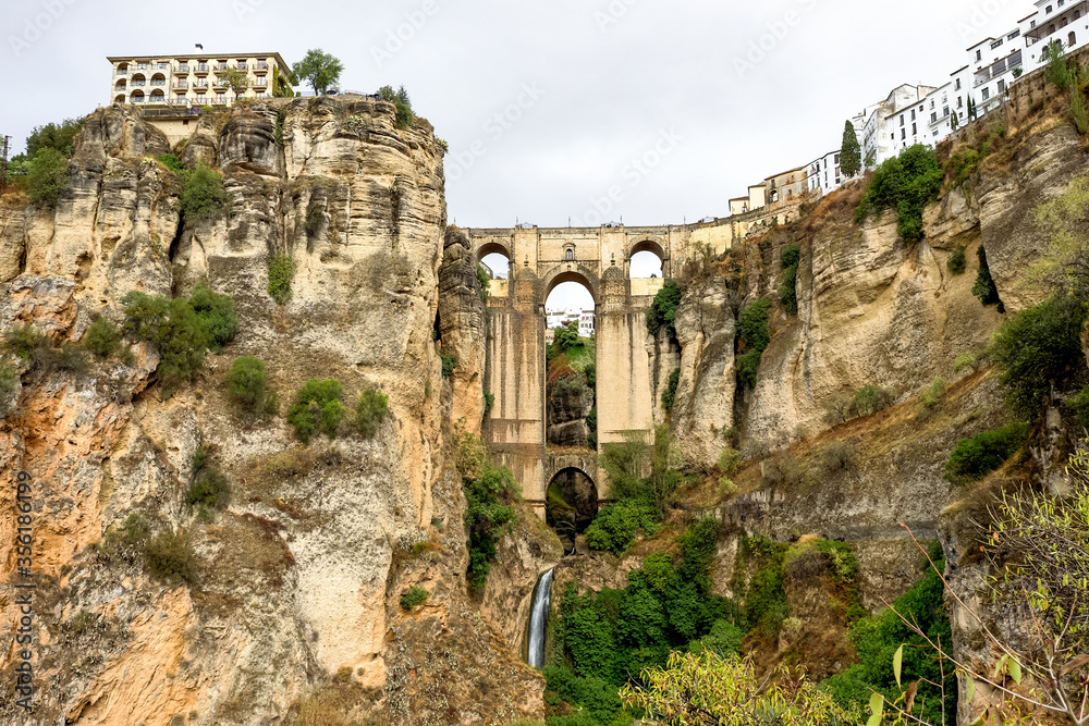 Fototapeta premium Puente Nuevo in Ronda, Spain spans the 120m deep chasm which divides the city.
