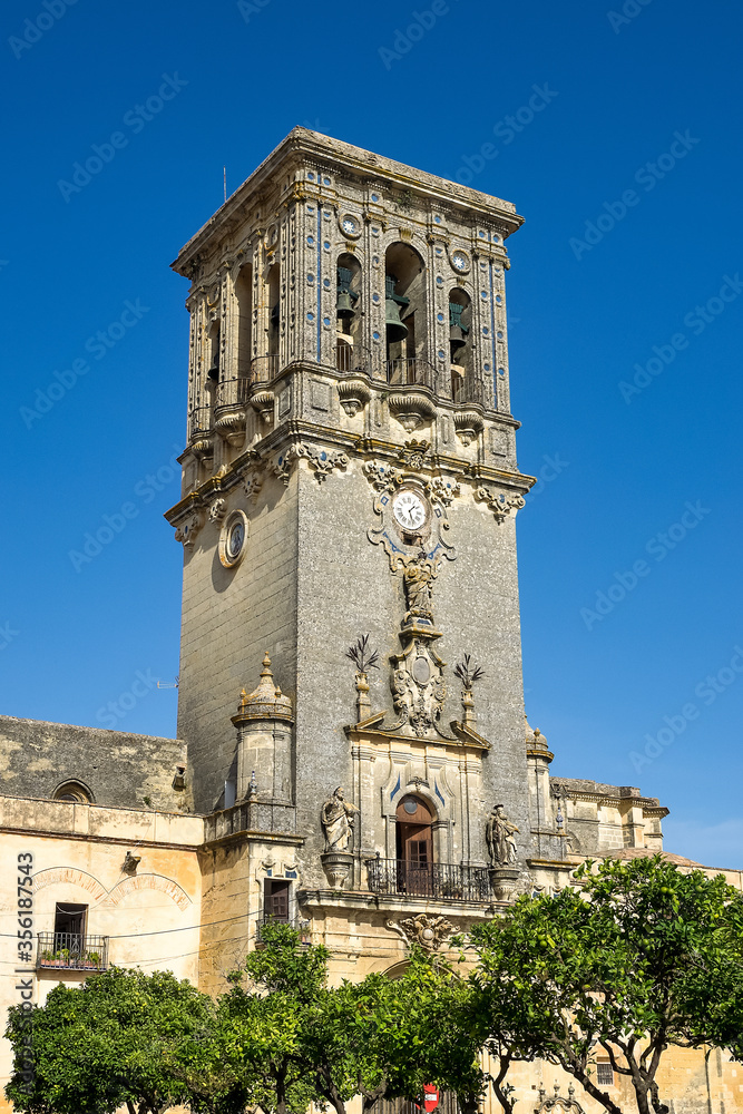 Bell tower of Santa Maria de la Asuncion church in Arcos de la Frontera, Spain