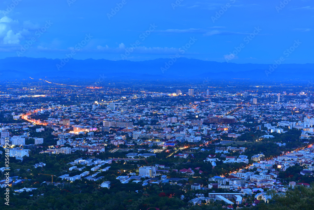 Photograph of Chiang Mai city in evening time with twilight and blue sky