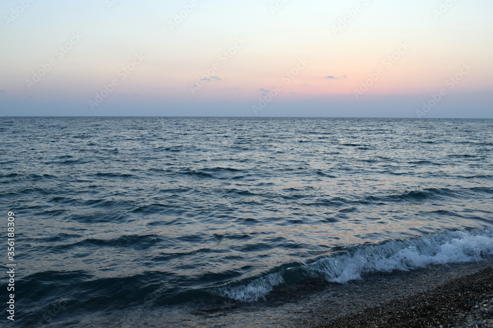 Sky, sea and pebble beach