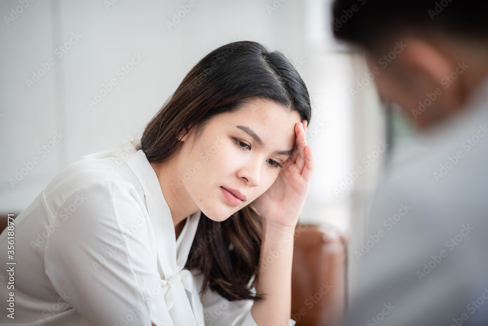 Mental health concept, Close-up of psychologist comforting his depressed patient, Doctor (psychiatrist) consultation and diagnostic examining woman patient Mental health concept, Close-up of psychologist comforting his depressed patient, Doctor (psychiatrist) consultation and diagnostic examining woman patient