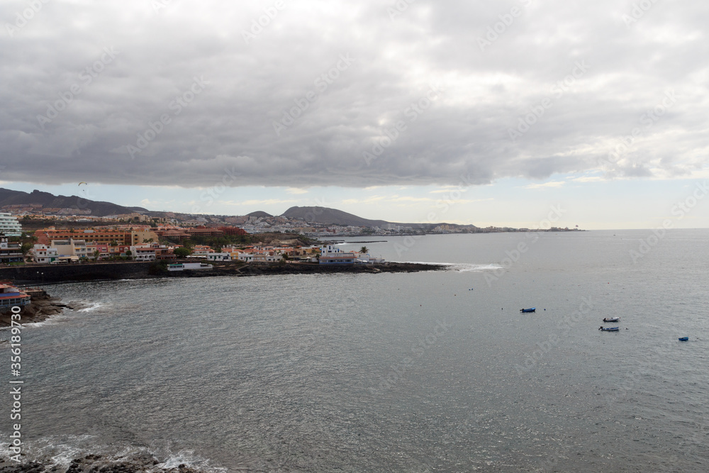 Coastline and town La Caleta panorama with Atlantic Ocean on Canary Island Tenerife, Spain