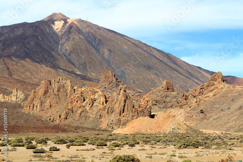 Volcano Mount Teide peak and rock formations Roques de Garcia in Teide National Park on Canary Island Tenerife  Spain