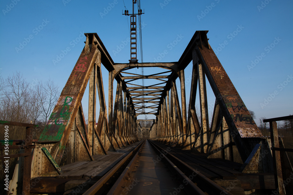 Old railway bridge during sunny day, Nowy Sacz, Malopolskie, Poland. Old railway bridge during sunny day, Nowy Sacz, Malopolskie, Poland.