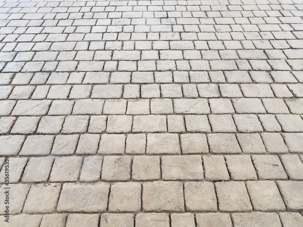 grey rectangular rock or stone tiles on ground