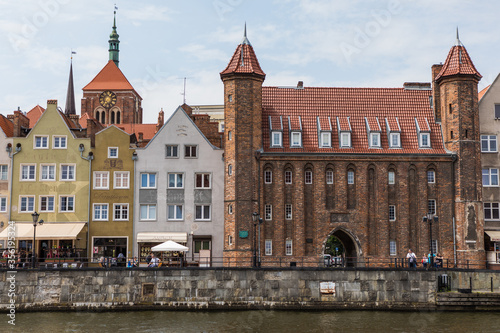 Gdansk, Poland - Juny, 2019. Gdansk old town and famous crane, Polish Zuraw. View from Motlawa river. The city also known as Danzig and the city of amber.