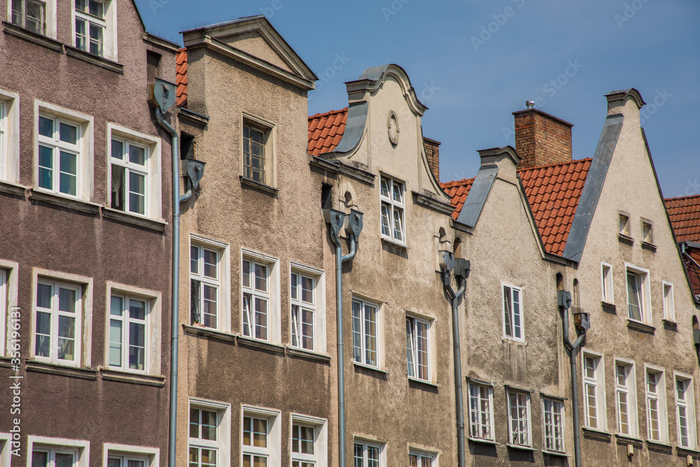 Gdansk, Poland - Juny, 2019:. Beautiful multi-colored houses in the old town in Gdansk. The central streets of the historic center of Gdansk. The main tourist attraction of Gdansk.