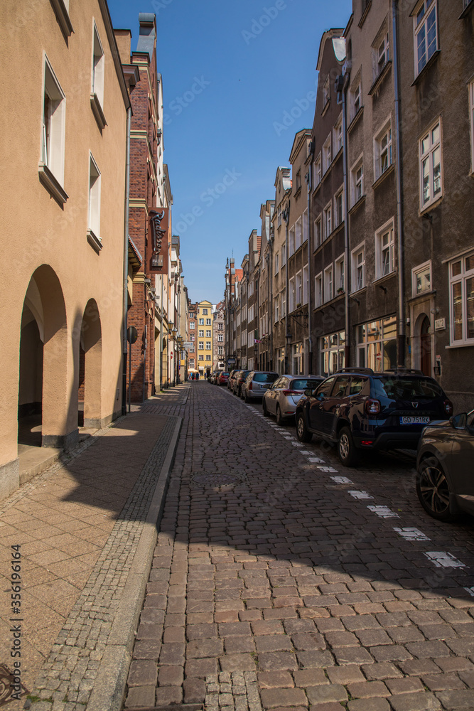 Gdansk, Poland - Juny, 2019:. Beautiful multi-colored houses in the old town in Gdansk. The central streets of the historic center of Gdansk. The main tourist attraction of Gdansk.