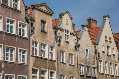 Gdansk  Poland - Juny  2019 . Beautiful multi-colored houses in the old town in Gdansk. The central streets of the historic center of Gdansk. The main tourist attraction of Gdansk.