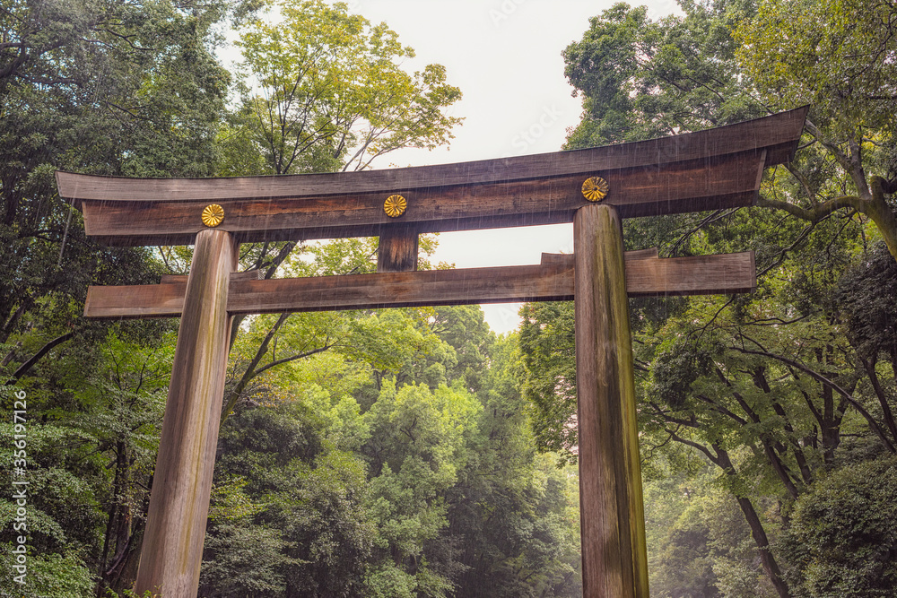 Torii gate leading to the Meiji Shrine complex. Meiji Shrine (Meiji Jingu) is a Shinto shrine dedicated to the deified spirits of Emperor Meiji and his wife, Empress Shoken, Tokyo, Japan Torii gate leading to the Meiji Shrine complex. Meiji Shrine (Meiji Jingu) is a Shinto shrine dedicated to the deified spirits of Emperor Meiji and his wife, Empress Shoken, Tokyo, Japan