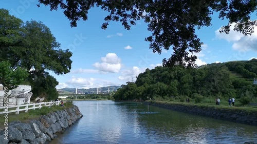 Bathers refreshing in the Barbadun estuary photo