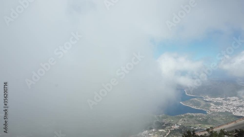 KAS, ANTALYA, TURKEY, 2020: Kalkan city and sea landscape with very strong fog 
