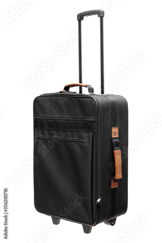 фотографія Rolling suitcase isolated on white.