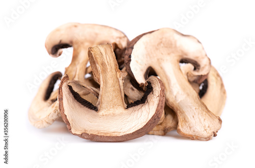 Dried sliced mushrooms isolated on white background. Dry champignons.