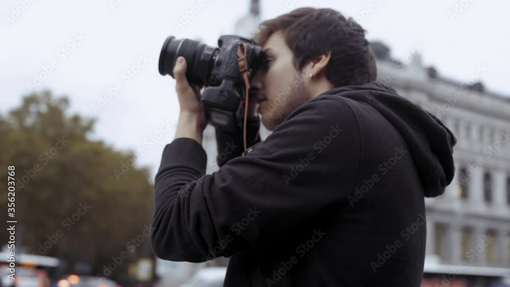 MS POV Man photographing with digital camera in Cibeles / Madrid, Spain MS POV Man photographing with digital camera in Cibeles / Madrid, Spain