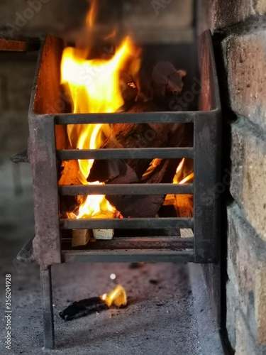 fireplace with burning logs
