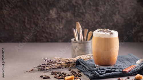 Εκτύπωση καμβά Latte or cappuccino with milk foam and lavender in a glass with coffee beans