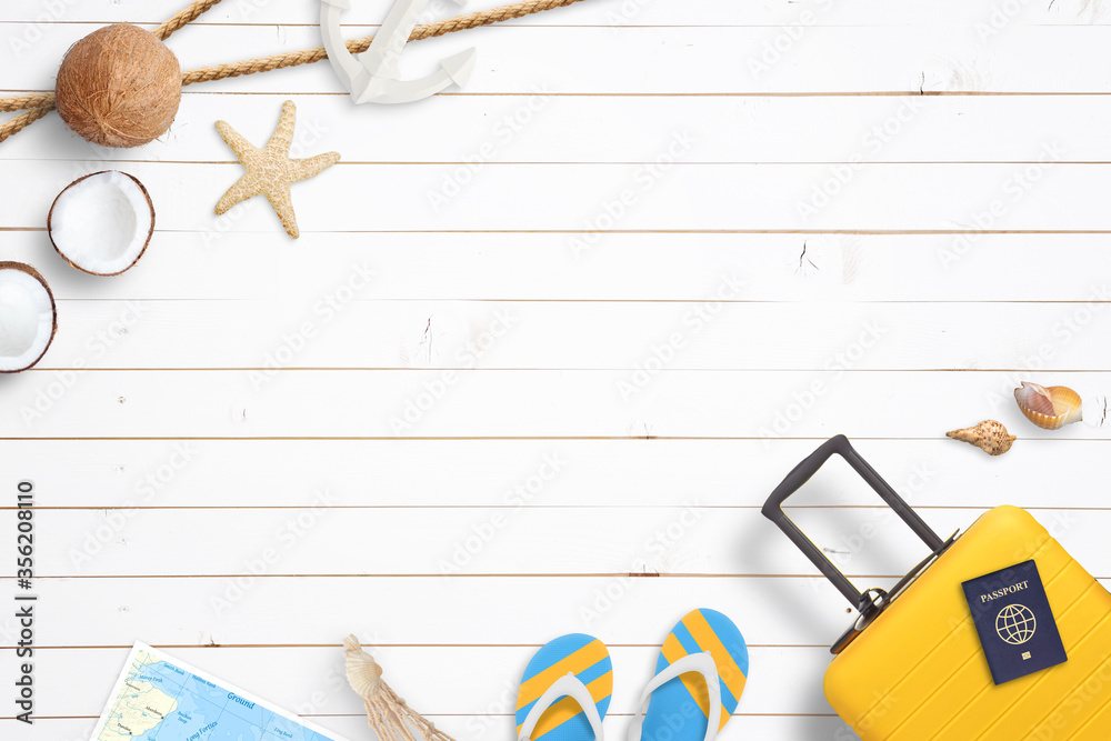 White wooden floor with travel bag, passport, slippers, shells, map, coconuts,  starfish, lifebelt, anchor. Summer travel concept with copy space in the middle