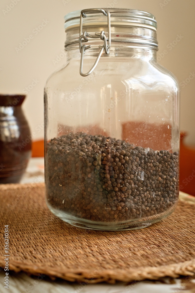 Jar full of peper seeds, closeup Jar full of peper seeds, closeup