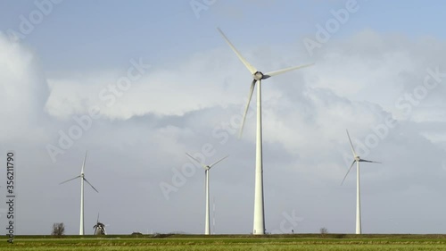 Wallpaper Mural WS Historical windmill Goliath near wind turbines in Eemshaven harbor area / Delfzijl, Groningen, Netherlands Torontodigital.ca