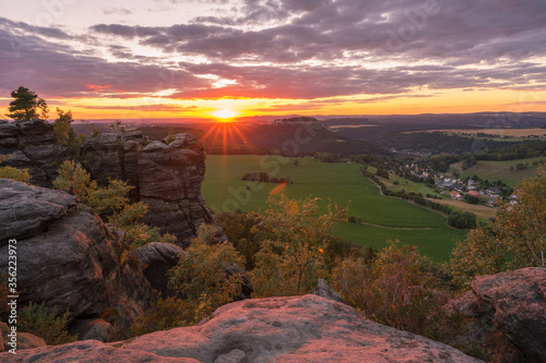 Amazing sunset in Saxon Switzerland National park at the mountain 