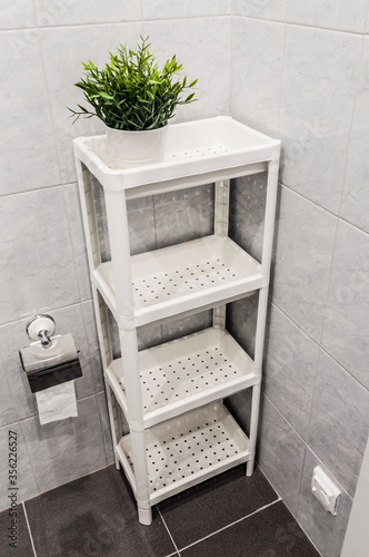 shelves for different accessories in the bathroom