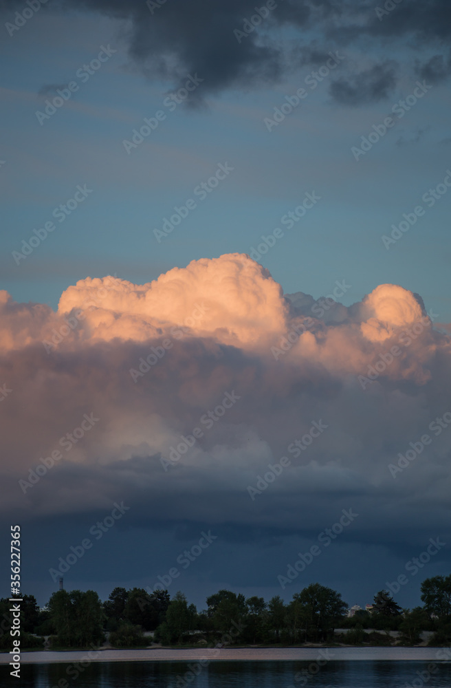 Beautiful magnificent clouds at sunset in the sky