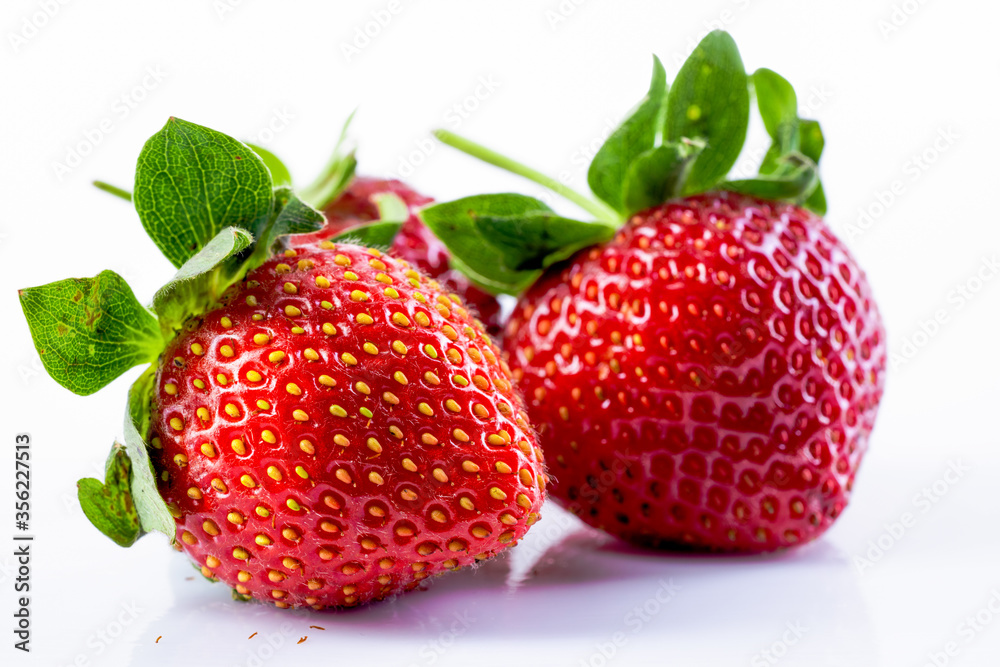 Close up Strawberry with green leaves on white background Close up Strawberry with green leaves on white background