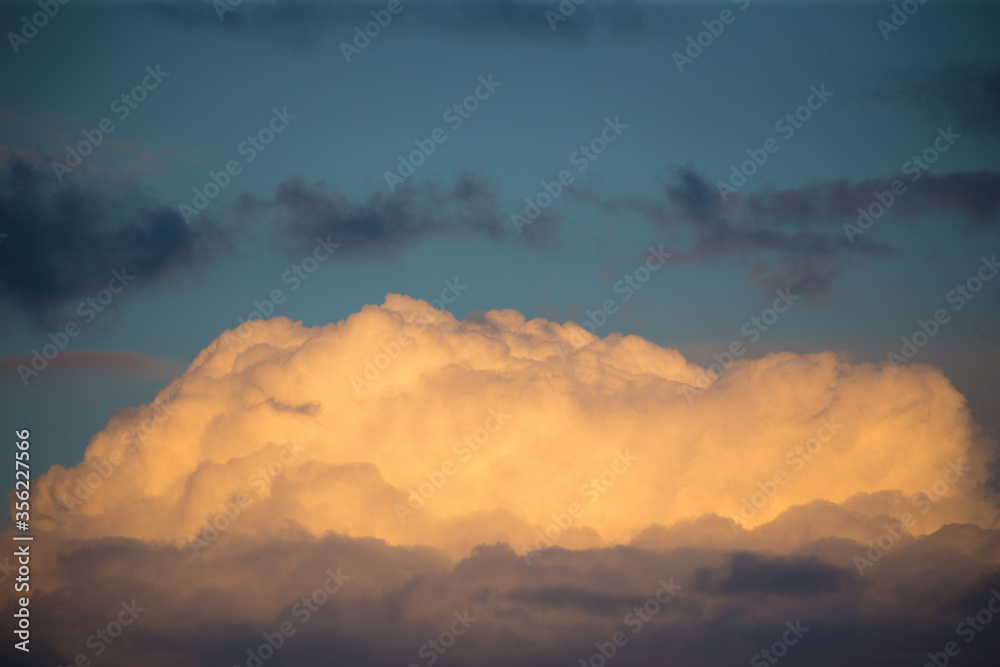 Beautiful magnificent clouds at sunset in the sky Beautiful magnificent clouds at sunset in the sky
