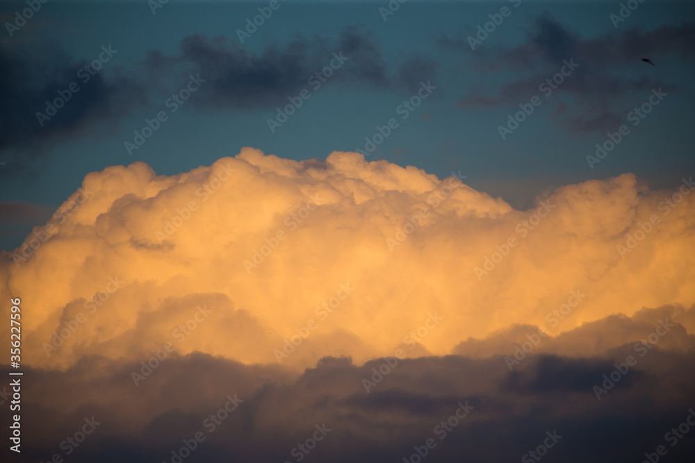 Beautiful magnificent clouds at sunset in the sky