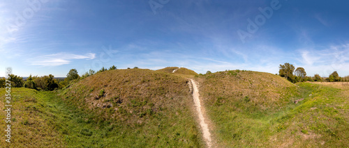 The site of a medieval castle from the eleventh century, where a five metre mound remains, along with five baileys.  The site is of special scientific interest (SSI) and nature reserve in Totternhoe.  photo