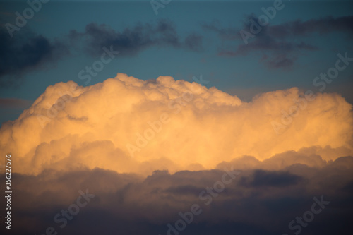 Beautiful magnificent clouds at sunset in the sky