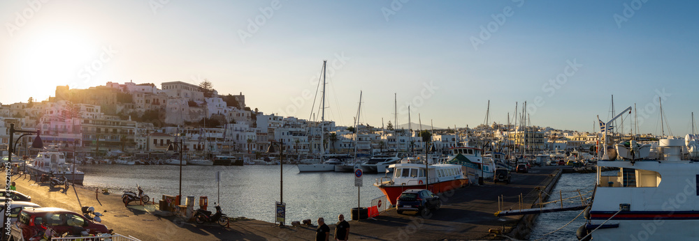 panoramic view of the port of Naxos at sunrise on a summer day, Cyclades Islands, Greece.