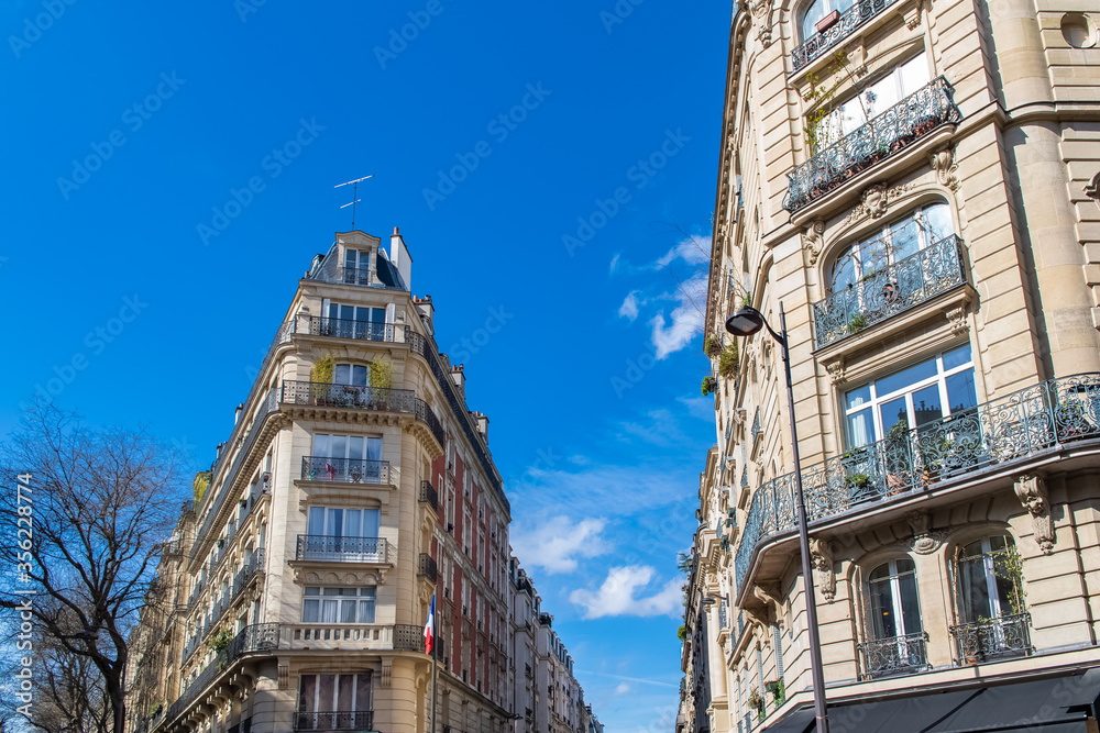 Paris, typical facade and street, beautiful building near Montmartre
Paris, typical facade and street, beautiful building near Montmartre