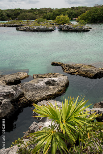 Natural View of Lagoon / river and park with clear turquoise water & rocky coastline of Xel Ha, Mayan Riviera , Mexico