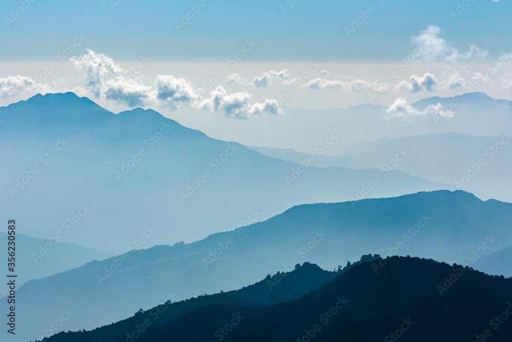 Mountain range foggy landscape . Nepal Himalayas 