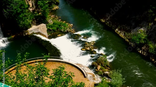 Aerial view over estuary of two fast mountain rivers during spring day.