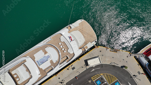 Aerial drone top down photo of luxury yacht anchored in Mediterranean bay marina © aerial-drone
