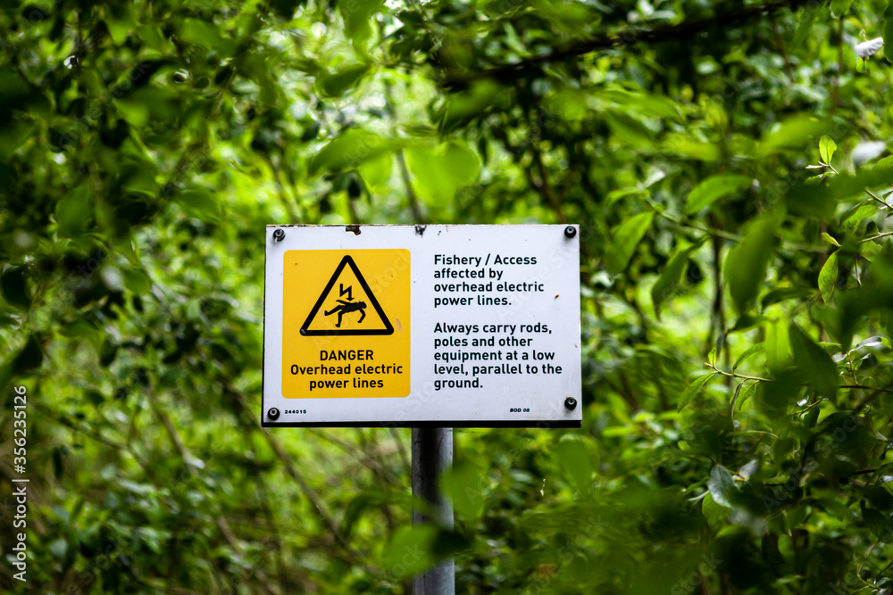 Warning signs for fishermen on Harthill reservoir, Sheffield, U.K.