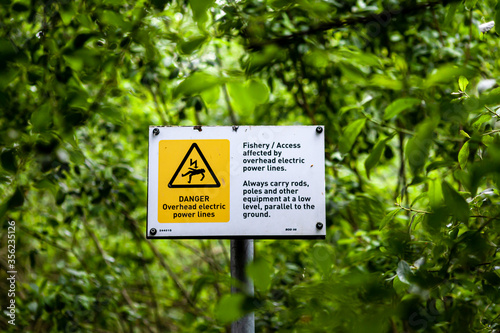 Warning signs for fishermen on Harthill reservoir, Sheffield, U.K. photo