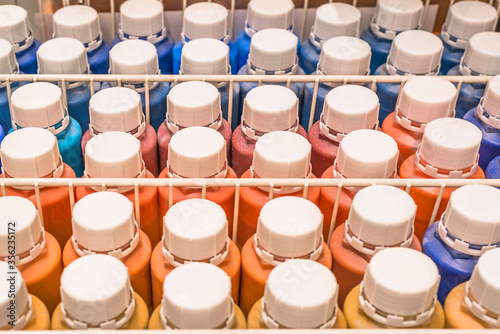 Paint cans with different colors. Multi-colored palette. Colorful sample paint pots