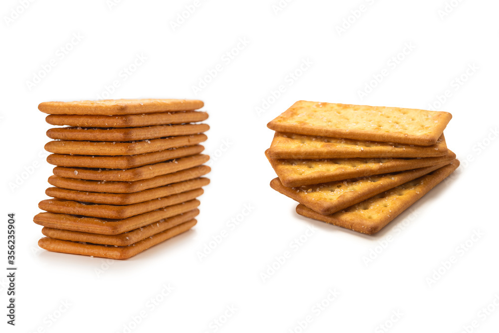 Cracker with salt isolated on white. Cracker with salt isolated on white.