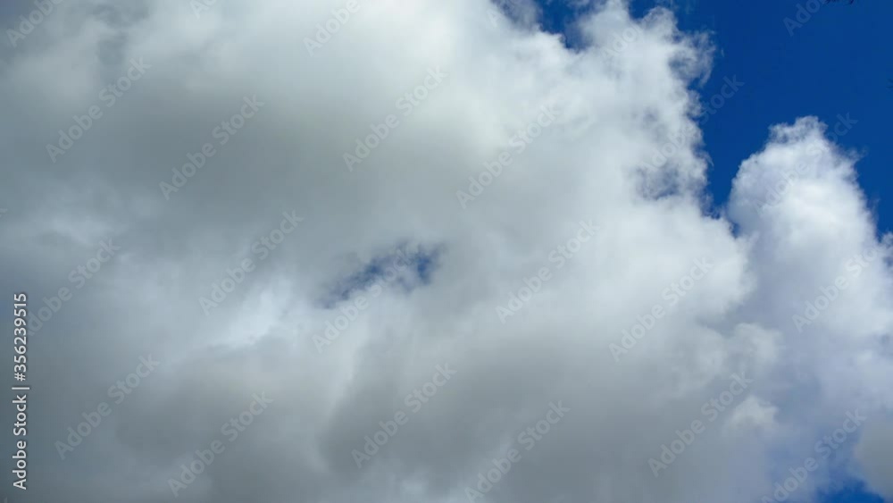 WS Fluffy clouds in blue sky / Kastel-Staadt, Rhineland-Palatinate, Germany WS Fluffy clouds in blue sky / Kastel-Staadt, Rhineland-Palatinate, Germany