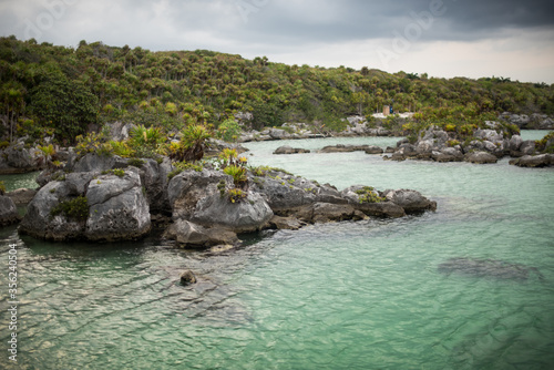Natural View of Lagoon / river and park with clear turquoise water & rocky coastline of Xel Ha, Mayan Riviera , Mexico