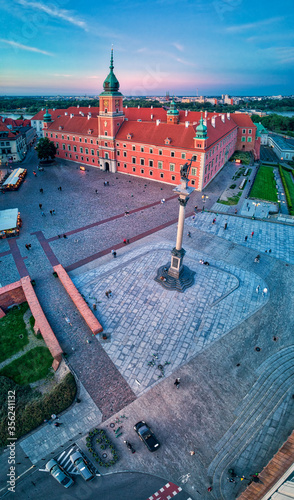 Beautiful panoramic aerial drone view on Warsaw Old town (POL: Stare Miasto) - the oldest district of Warsaw (13th century), Royal Castle, square and the Column of Sigismund III Vasa at sunset, Poland photo